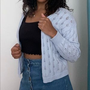 Light blue cotton cardigan.